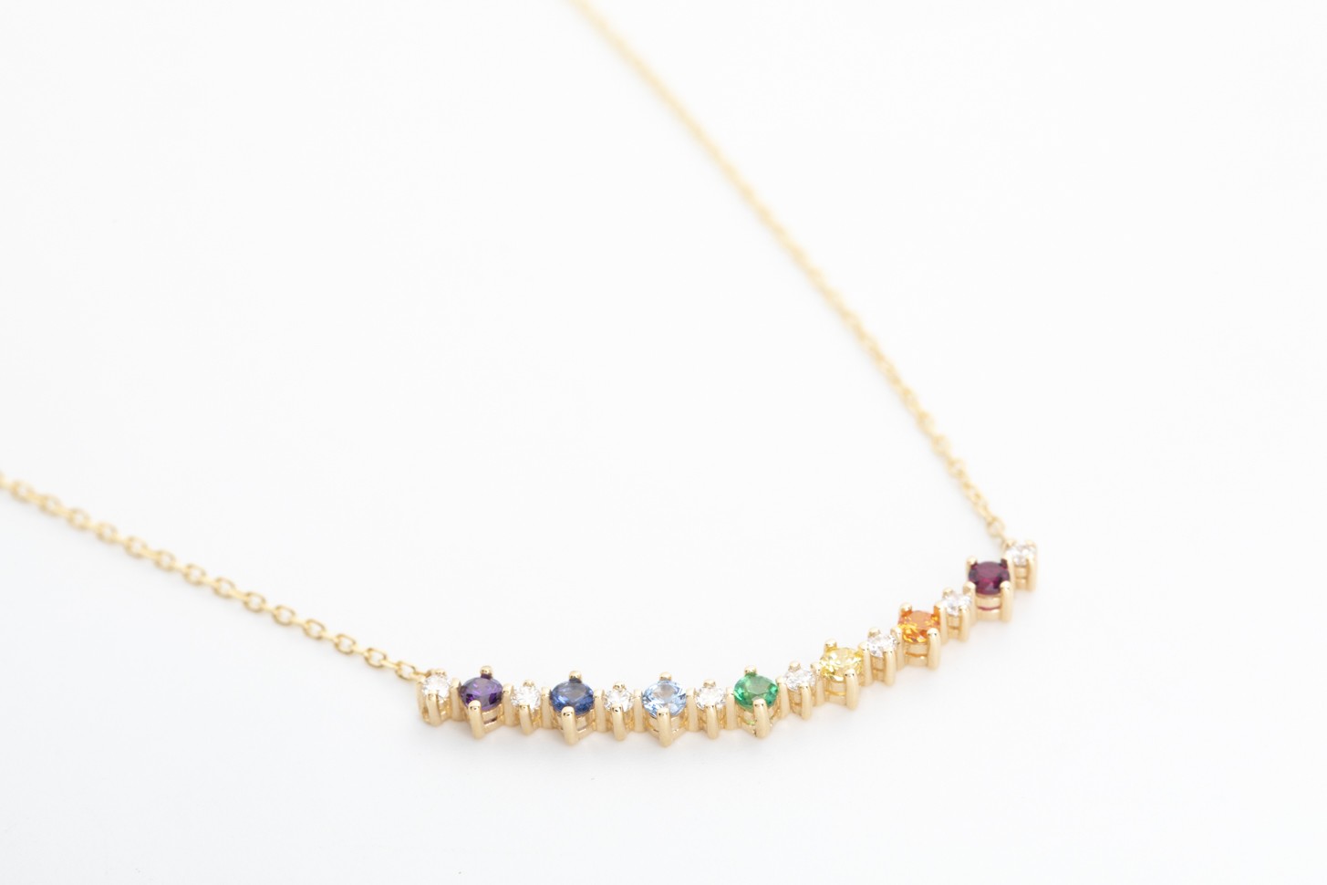 Collar arcoiris con topacios y diamantes